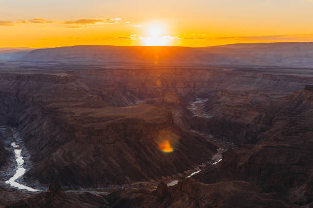 istock Watching the summer sunset above the scenic Fish River Canyon in Namibia 1323698175