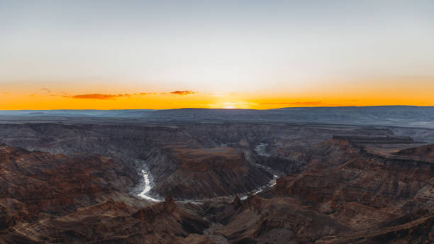 istock Watching the summer sunset above the scenic Fish River Canyon in Namibia 1323698186