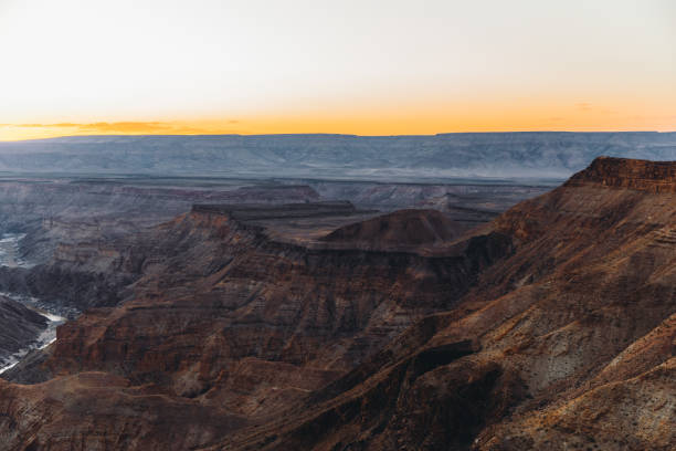 istock Watching the summer sunset above the scenic Fish River Canyon in Namibia 1323698187