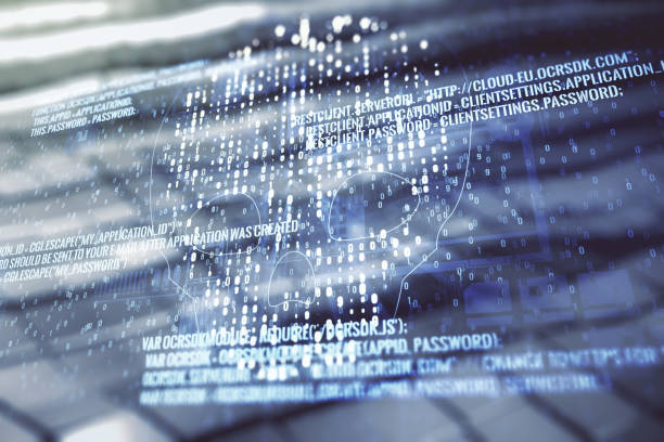 istock Double exposure of abstract virtual creative code skull hologram on blurry metal background. Malware and cyber crime concept 1323700466