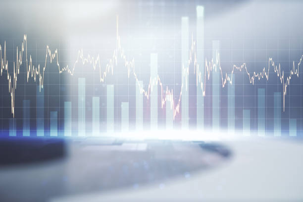 istock Multi exposure of abstract virtual financial graph hologram on empty corporate office background, forex and investment concept 1323701156
