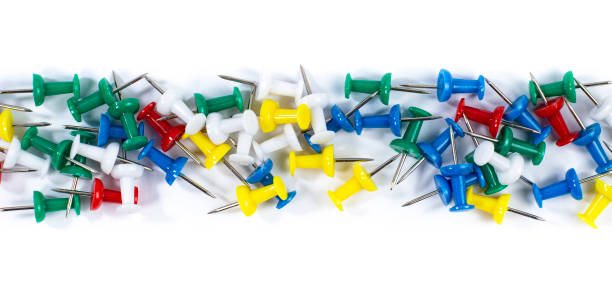 istock Office board pushpins isolated on white, stationery or office goods banner concept. 1323702794