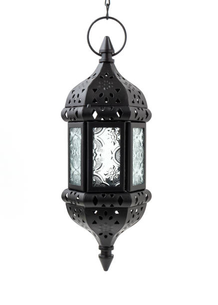 istock Metal hanging Moroccan candle lantern isolated on white background. 1323705198