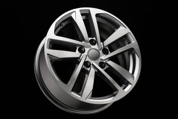 istock grey modern alloy wheel side view on black background 1323708213