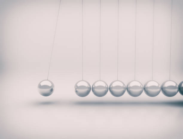 istock Newtons cradle - Metal balls in motion 1323714397