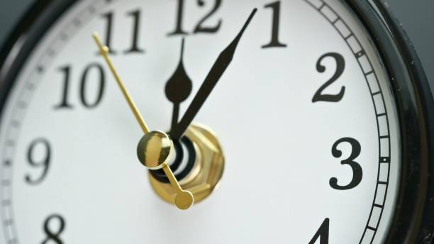 istock Clock face view Time running out concept. Close up of table business timer. Every minute counts idea. 1323715971