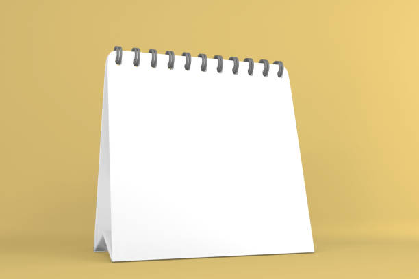 istock white calendar on yellow background.3D rendering 1323720560