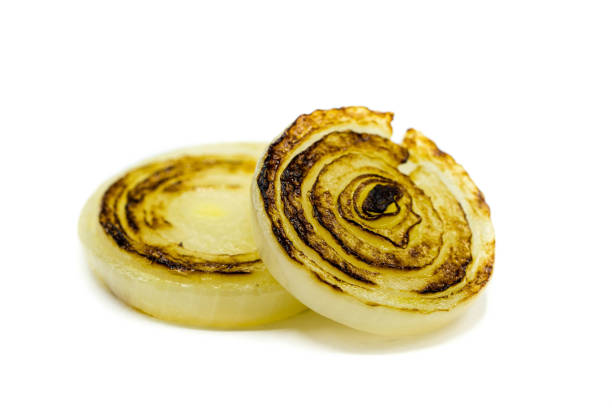 istock Grilled onion rings isolated on white background 1323722324
