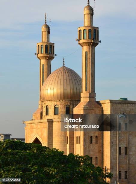 Golden Dome Of The Almahdi Mosque Alzahraa Cultural Center Marcory Abidjan Ivory Coast Stock Photo - Download Image Now