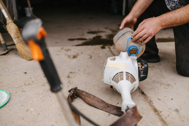 istock A man pours fuel into a grass trimmer 1323725370
