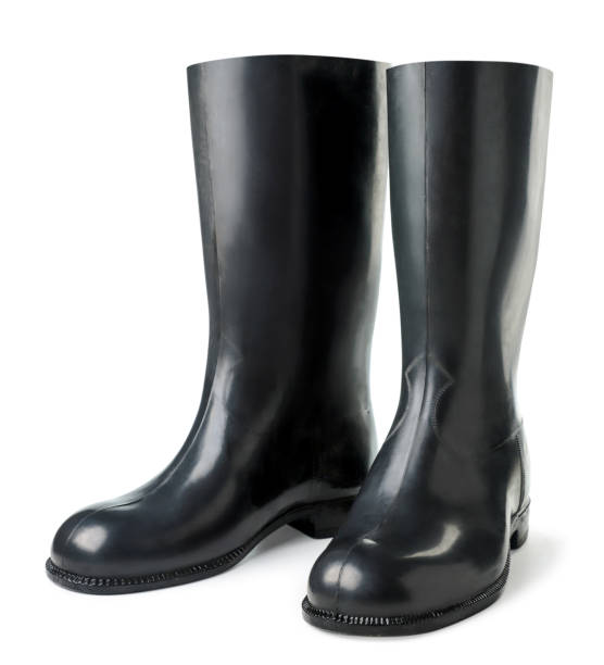 istock Black rubber boots on a white background. Isolated 1323729240
