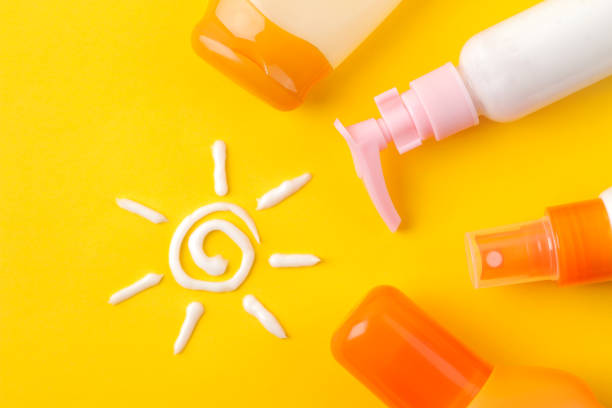 istock sunscreen remedy. various sunscreens and sun cream on a bright yellow background. Sun protection. Ultraviolet protection. Summer. top view. 1323736473