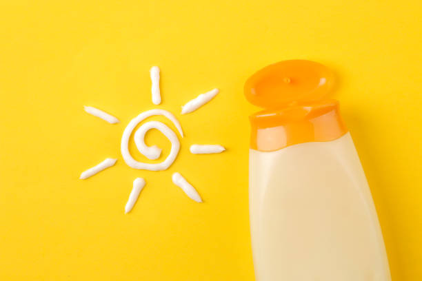 istock sunscreen remedy. various sunscreens and sun cream on a bright yellow background. Sun protection. Ultraviolet protection. Summer. top view. 1323736496