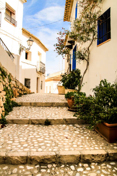 istock Narrow streets and whitewashed facades in Altea village 1323736939