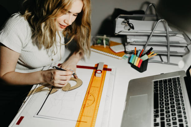 istock Young female working in his home office 1323736941