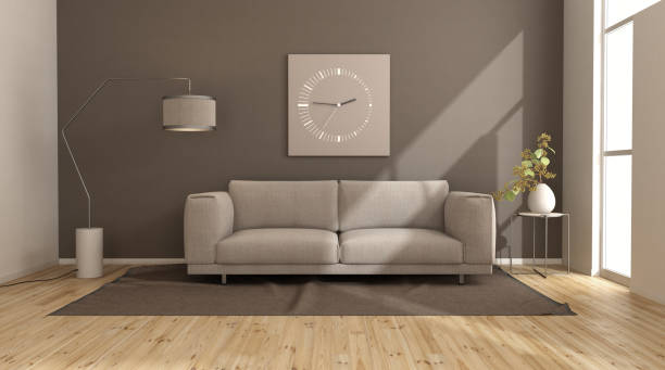 istock Modern living room with brown wall and beige sofa 1323739860