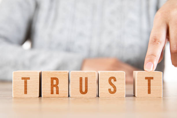 istock Word Trust with Wooden Cubes 1323741713