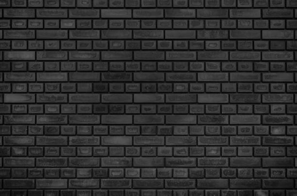 istock Empty texture background of black brick wall. Home, office, cafe, restaurant design backdrop. 1323746243