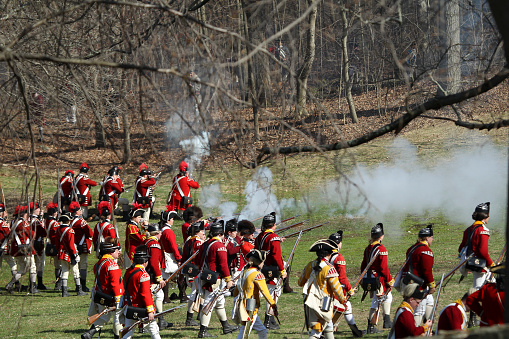 Memorial Day Celebration - Parker Revenge Battle Demonstration held in Lexington, MA on Sunday, April 20, 2014.Hundreds of British and Colonial Re-enactors engaged in a tactical weapons demonstration showing the running battle that took place along this deadly stretch of road on the border of Lincoln and Lexington on April 19, 1775.