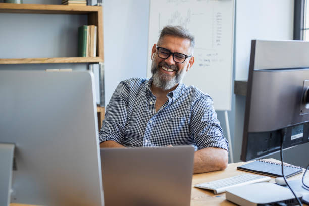 istock Mature businessman working from home office 1323758278