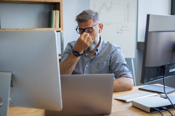 istock Mature businessman working from home office 1323758556