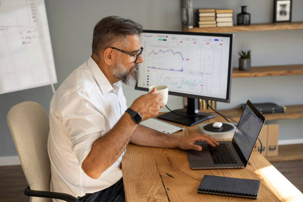 istock Mature businessman working from home office 1323758628