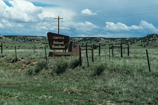 Colorado, USA - May 18, 2021: Sign for the Comanche National Grassland in rural Colorado