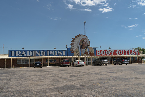 Clinton, Oklahoma - May 6, 2021: Exterior of the famous Cherokee Trading Post & Boot Outlet