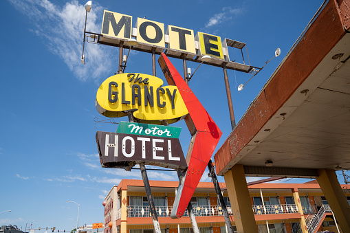 Clinton, Oklahoma - May 6, 2021: The Glancy Motel neon sign, now abandoned, along the historic US route 66