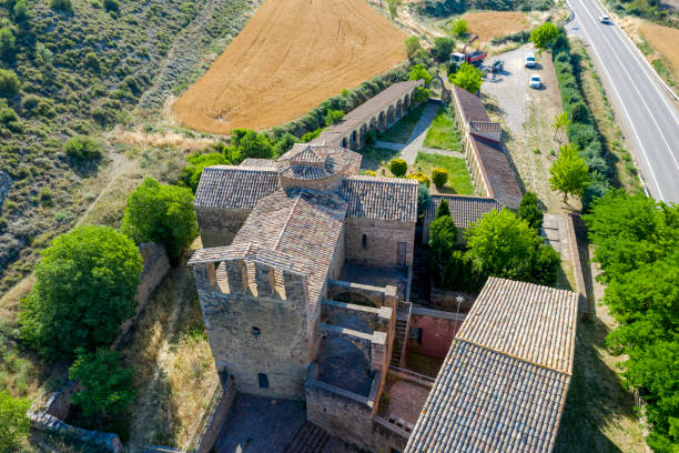 Church of Santa Maria del Priorat in Castellfollit de Riubregos, Anoia Spain. Church of Santa Maria of the Priorat in Castellfollit de Riubregos, Anoia Spain. Declared cultural heritage of national interest. Front aerial view national cemetery stock pictures, royalty-free photos & images