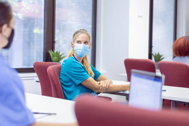 istock Nurses attend evening lecture during covid pandemic 1323773485