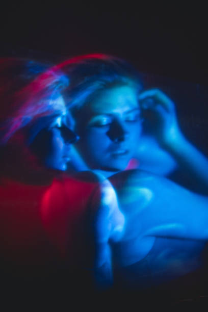 istock esoteric enlightenment woman in pink blue light 1323773670