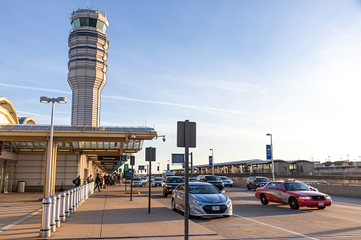 Traffic is seen at the depatures area of Terminal B/C at Ronald Reagan Washington National Airport on clear and sunny afternoon. Reagan National Airport is the closest airport to Washington, DC, the US Capital.