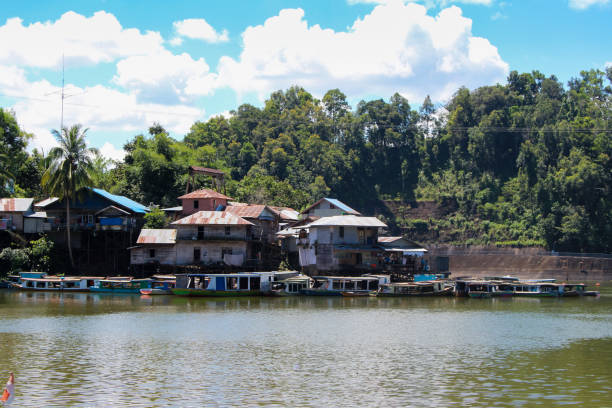 istock Beautiful lake surrounded by Forrest and villages 1323790880