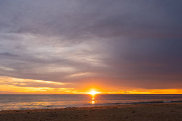 istock Sunset in the sea 1323792042