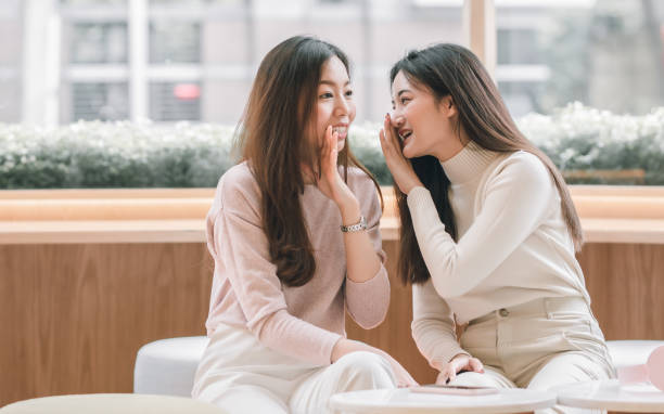 Women talking together in coffee shop