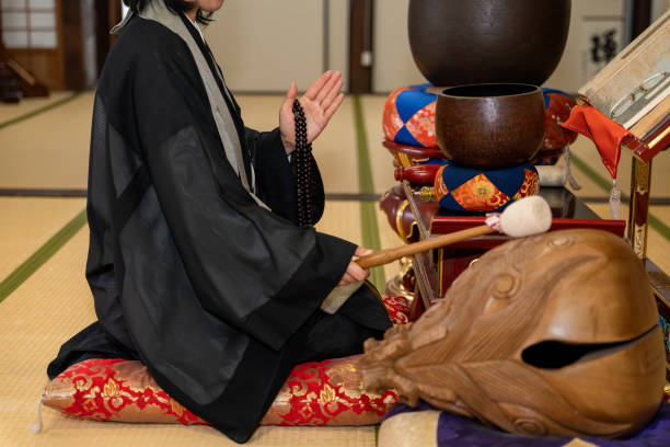 Photograph of a Japanese female monk, nun Photograph of a Japanese female monk, nun chan buddhism photos stock pictures, royalty-free photos & images