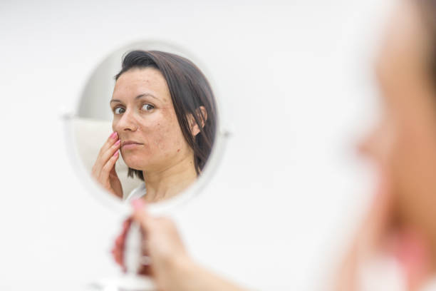 istock Photo of mirror reflection with female face. 1323798466