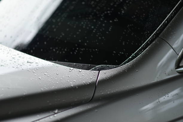 istock front edge of the car with water droplets 1323803653