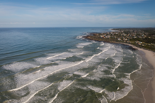 Beautiful aerial image overlooking a beautiful coastline near Cape Town, South Africa. Sunning aerial photo of Pearly Beach near Cape Town, South Africa
