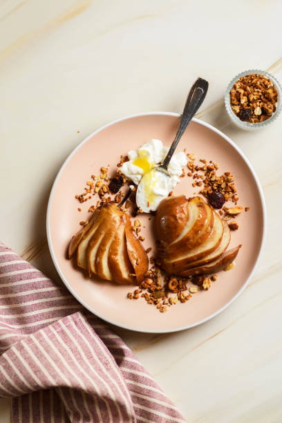 istock Baked pear with Greek yogurt 1323809156