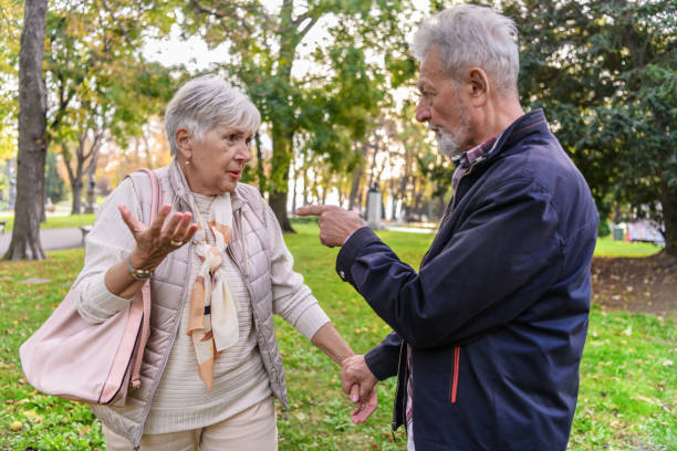 istock An Older Couple is Arguing in a City Park. 1323809302