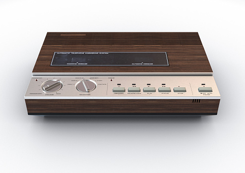 A vintage analogue answering machine for the 80's made of wood and chrome on an isolated white background - 3D render