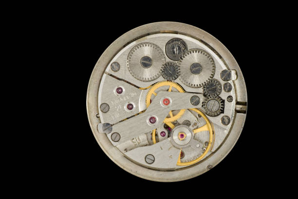 istock Clockwork of an old Soviet Union watch on a black background 1323815147