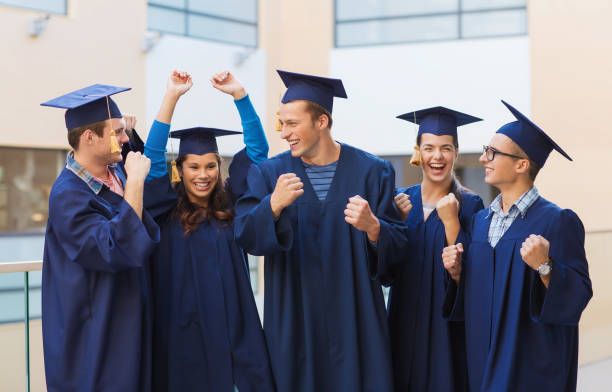 istock group of smiling students in mortarboards 1323816425