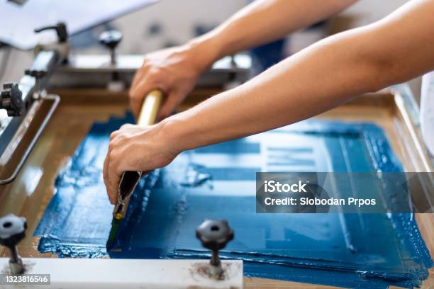 Close Up Of Screen Printing On Shirts And Textiles Stock Photo - Download Image Now