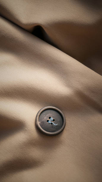 istock Button on trench coat 1323816790