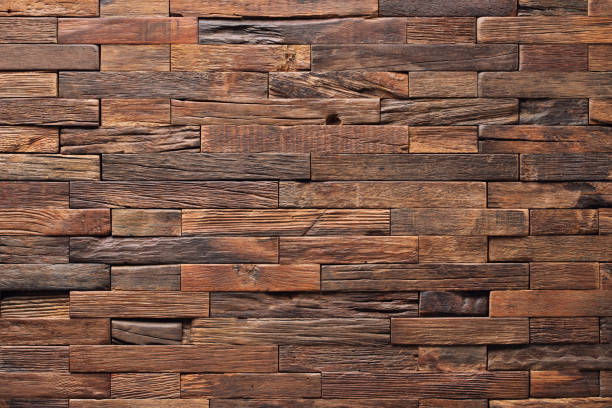 istock wood texture of wall panel or table. mosaic from old boards 1323827131