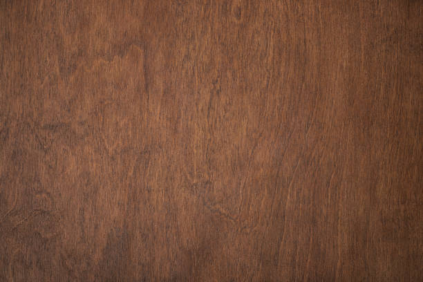 istock brown wood texture, dark wooden background for design 1323827160