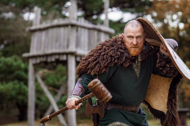 istock Russian viking warrior king in a forest 1323828176